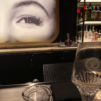 A screenshot of Marilyn Monroe's eyes behind the secret bar at Circa Resort.